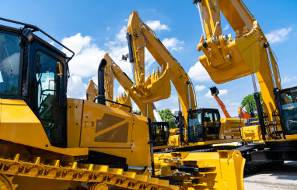 Gelber Bagger und gelbe Planierraupe